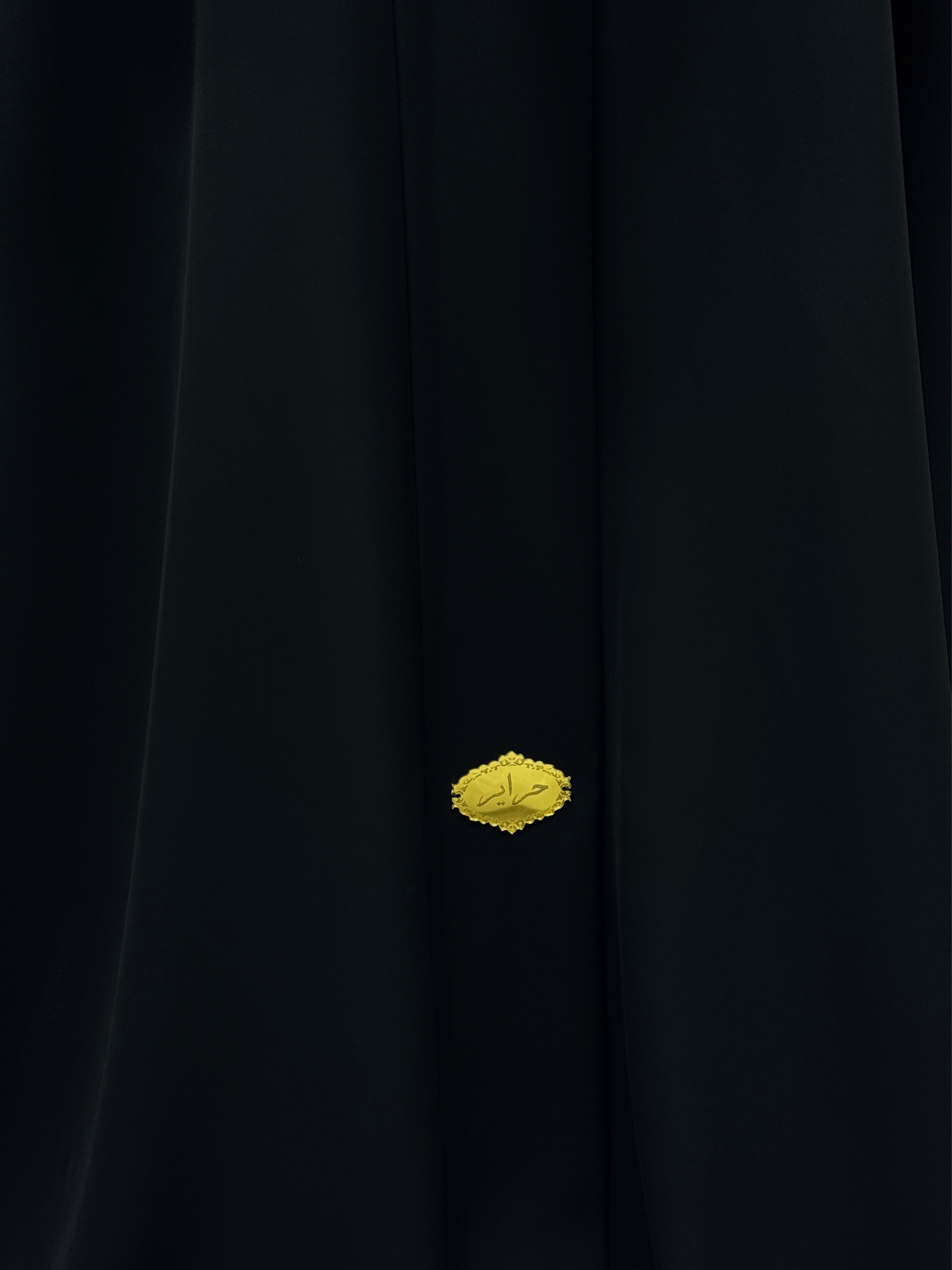 ZW 194 Hajar Classic Black Abaya with Gold Emblem Accent