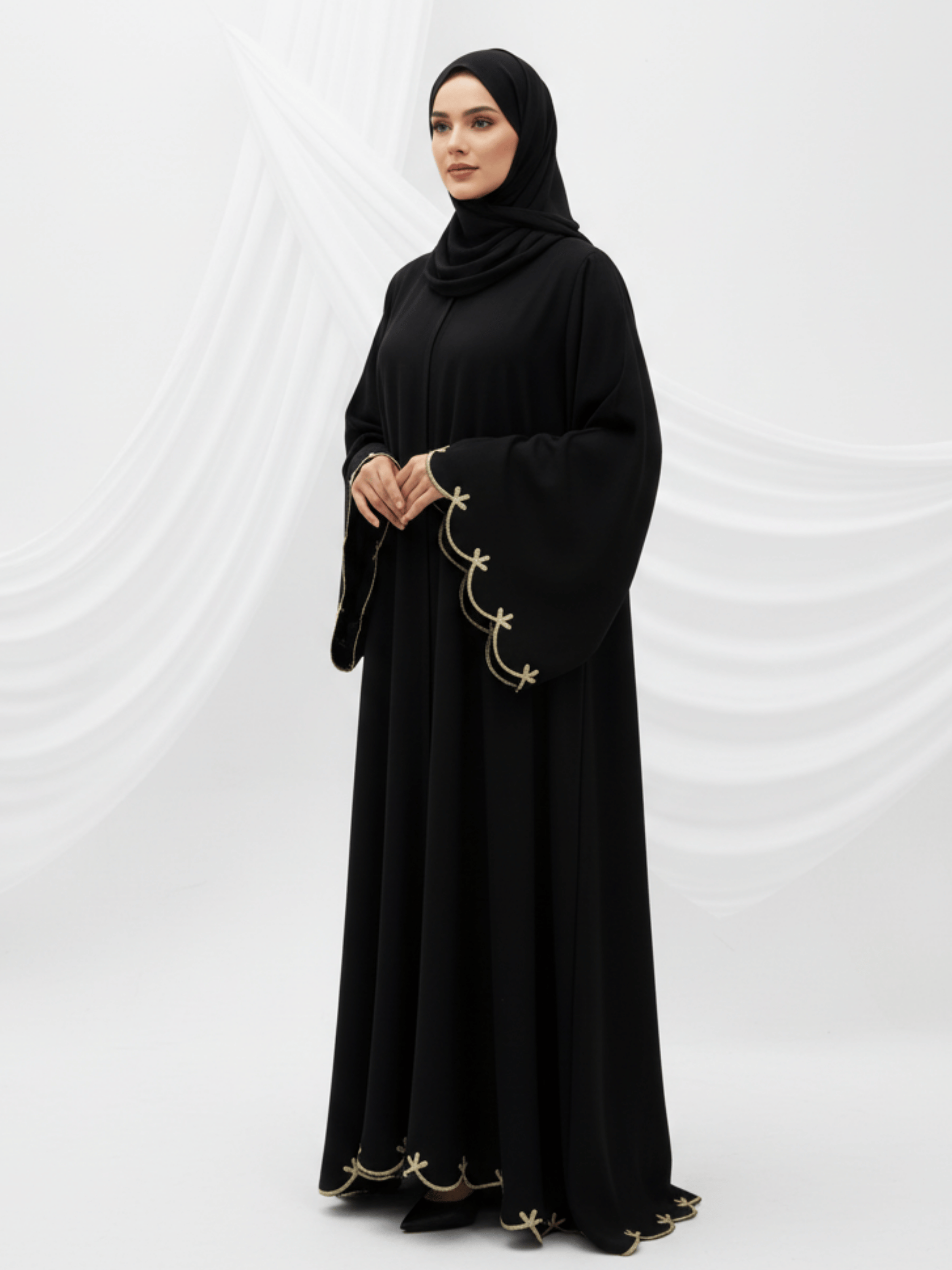 ZW 304 Reem Black Abaya with Gold Wave Embroidery